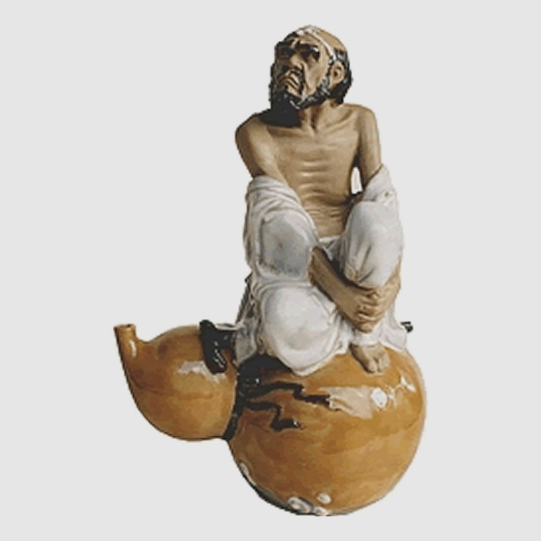 Mann sitzend auf Krug