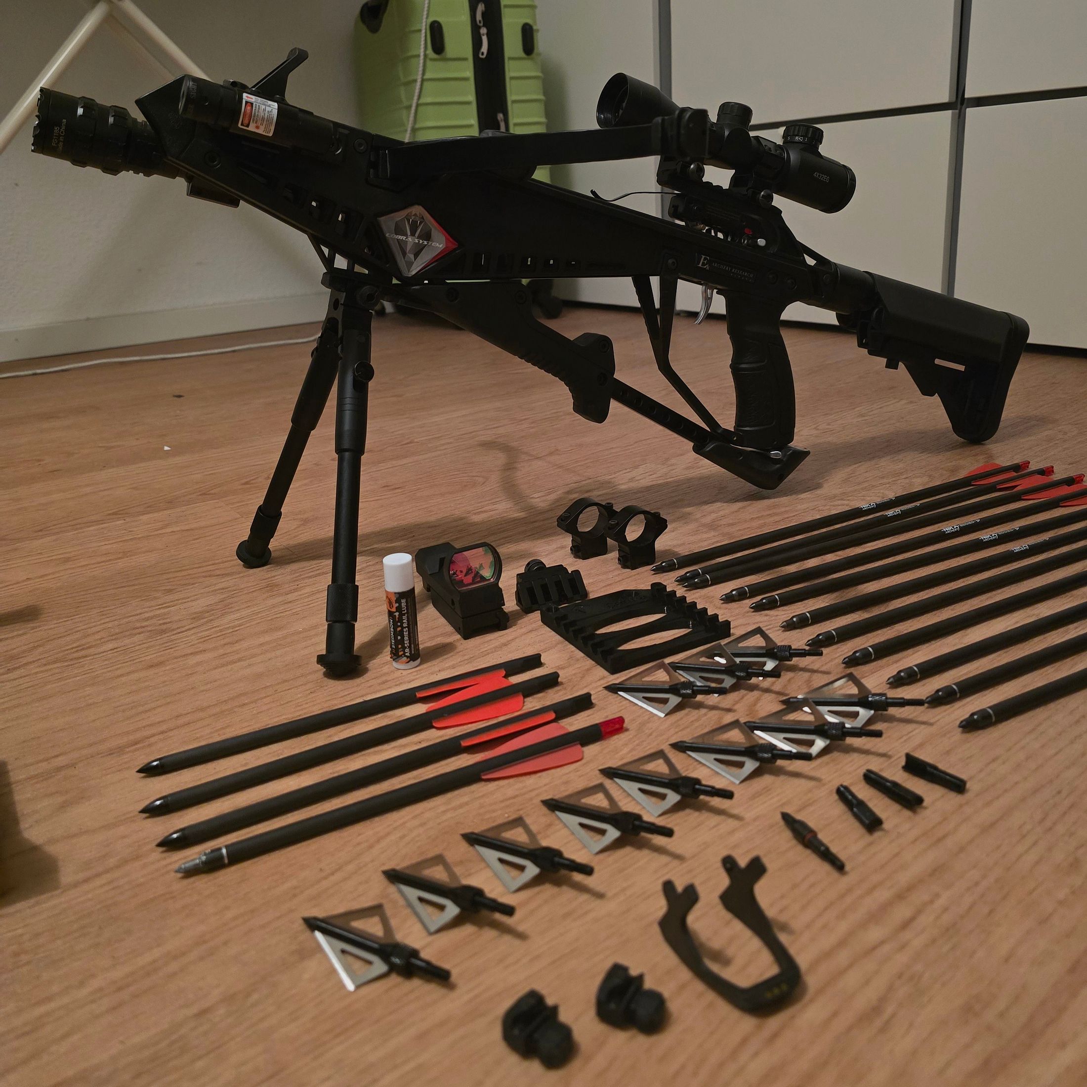 An Archery Cobra RX130 Sniper Crossbow with a lot of accessories