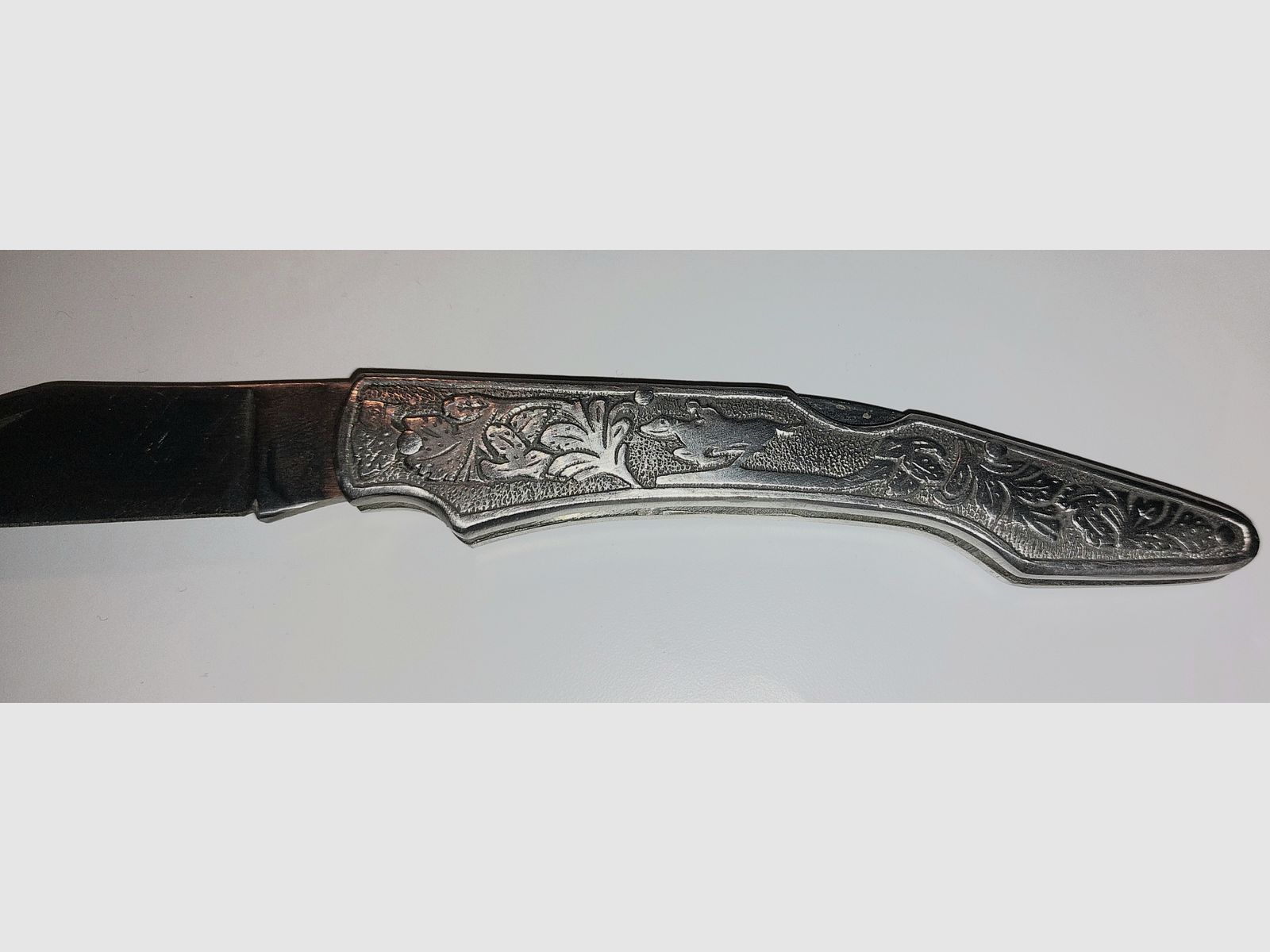 Pocket knife with rider motif, price negotiable