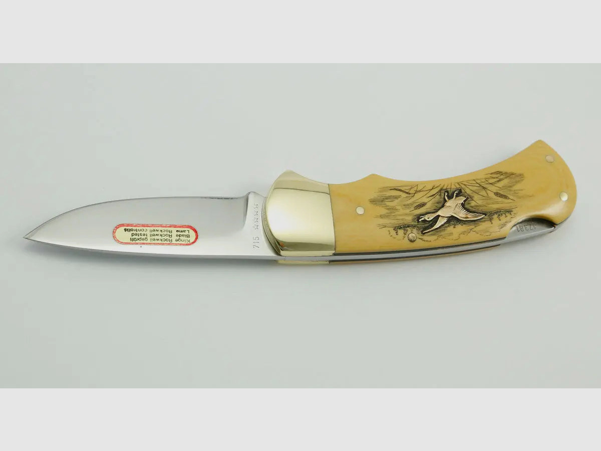 (Rarities) Puma 4-Star 715 with brass inlays duck and pheasant, warranty card, 1983