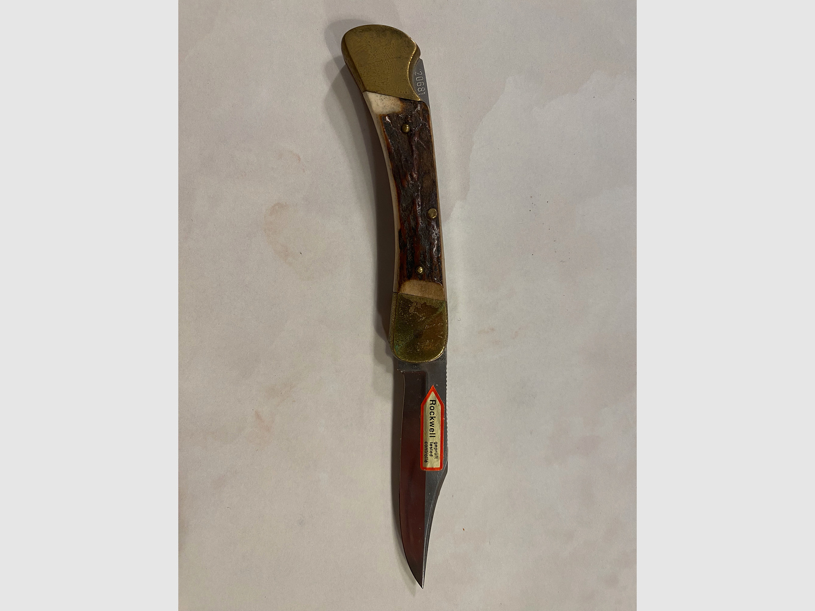 Coltello pieghevole classico Folding-Hunter – accessori in ottone – manico in corno di cervo/osso – testato Rockwell