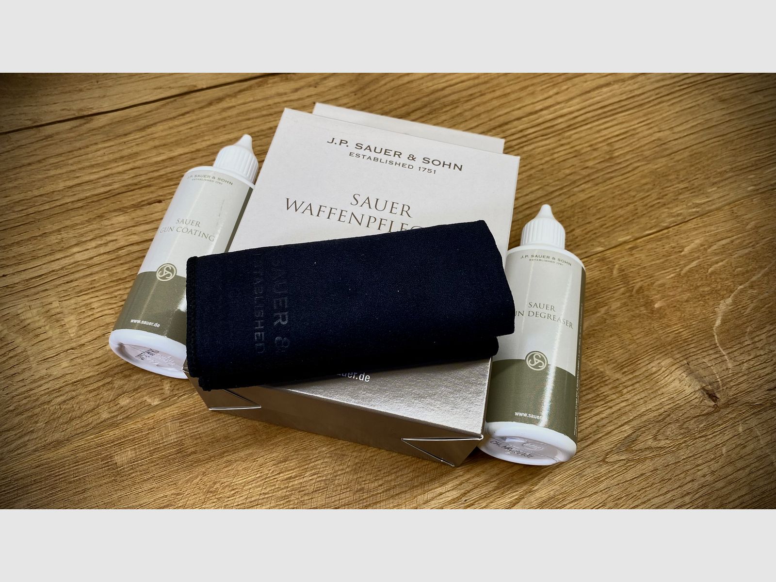 Samopowtarzalna strzelba Sauer SL5 Zestaw kompletny / Kaliber 12/76 / w tym walizka, skórzany pasek, zestaw do czyszczenia i czapka Sauer