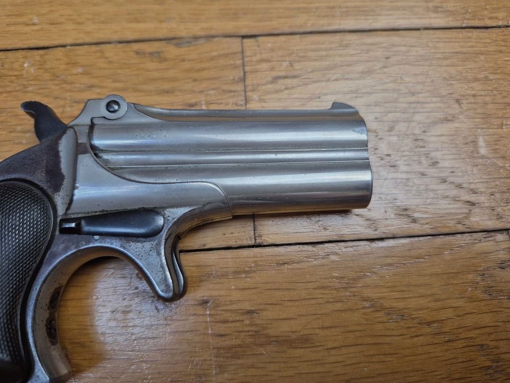 Ikonische Doppel-Pistole Derringer Remington M95 – Kal. 41RF – Typ II – Nickel-Finish – Ausgezeichneter mechanischer Zustand – Sehr schöne Läufe – Perfekte Auswurf – Griffschalen aus Ebonit in sehr gutem Zustand – 80.000 Exemplare – Gürtelholster! – Ein „Joker“ im Ärmel eines As in ausgezeichnetem Zustand – TBE++, Bild 17 von 22