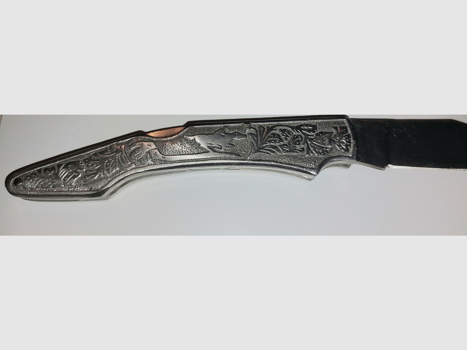 Pocket knife with rider motif, price negotiable
