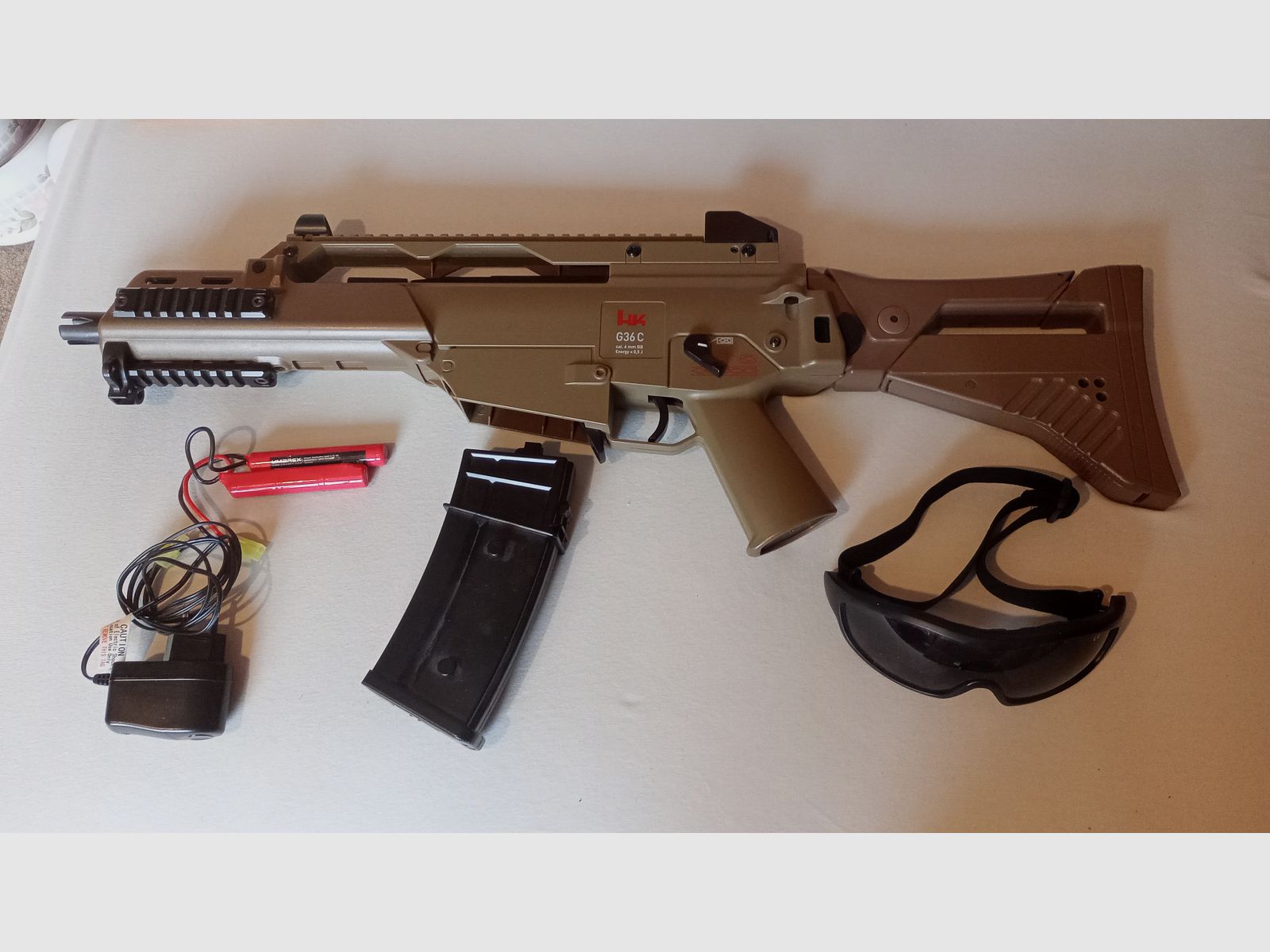 Airsoft G36C Desert with 400 round magazine & goggles (used, 0.5 Joule)