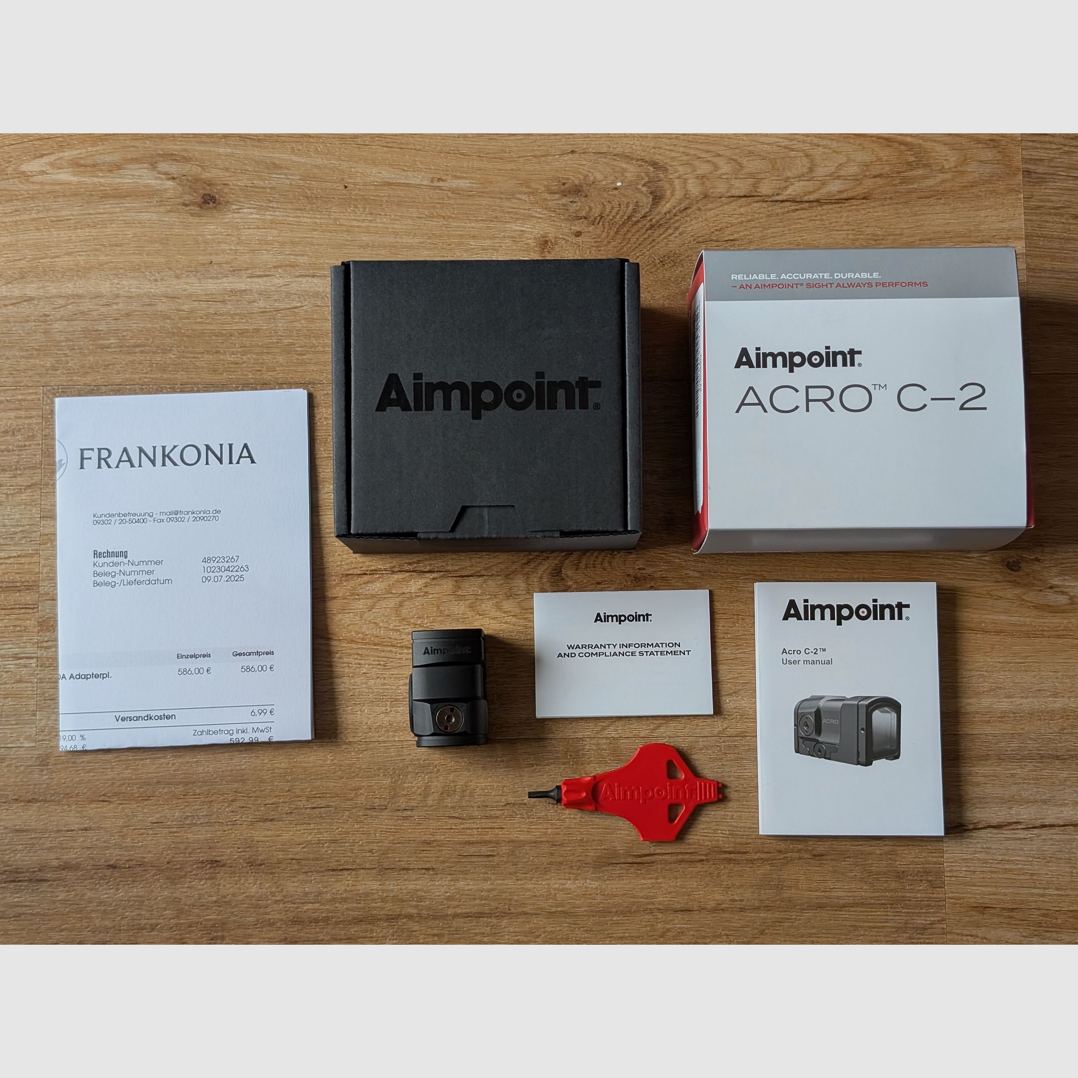 Two months old Aimpoint ACRO C-2 with receipt