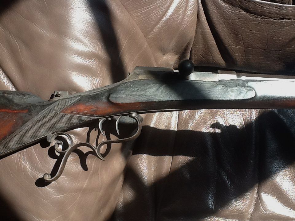 Unknown antique weapon - old rifle cartridge?