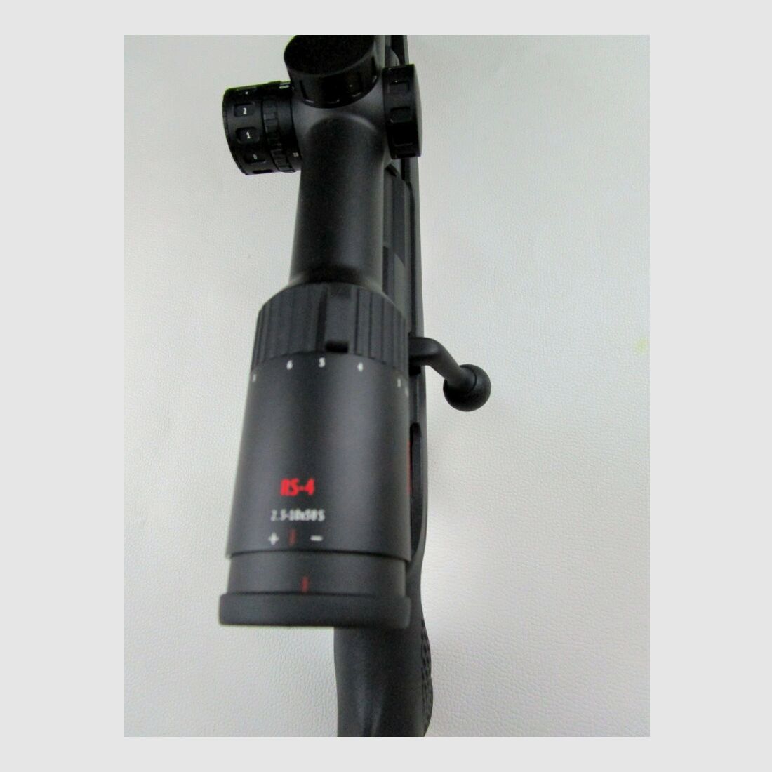 Mauser 25 Extreme with scope and silencer