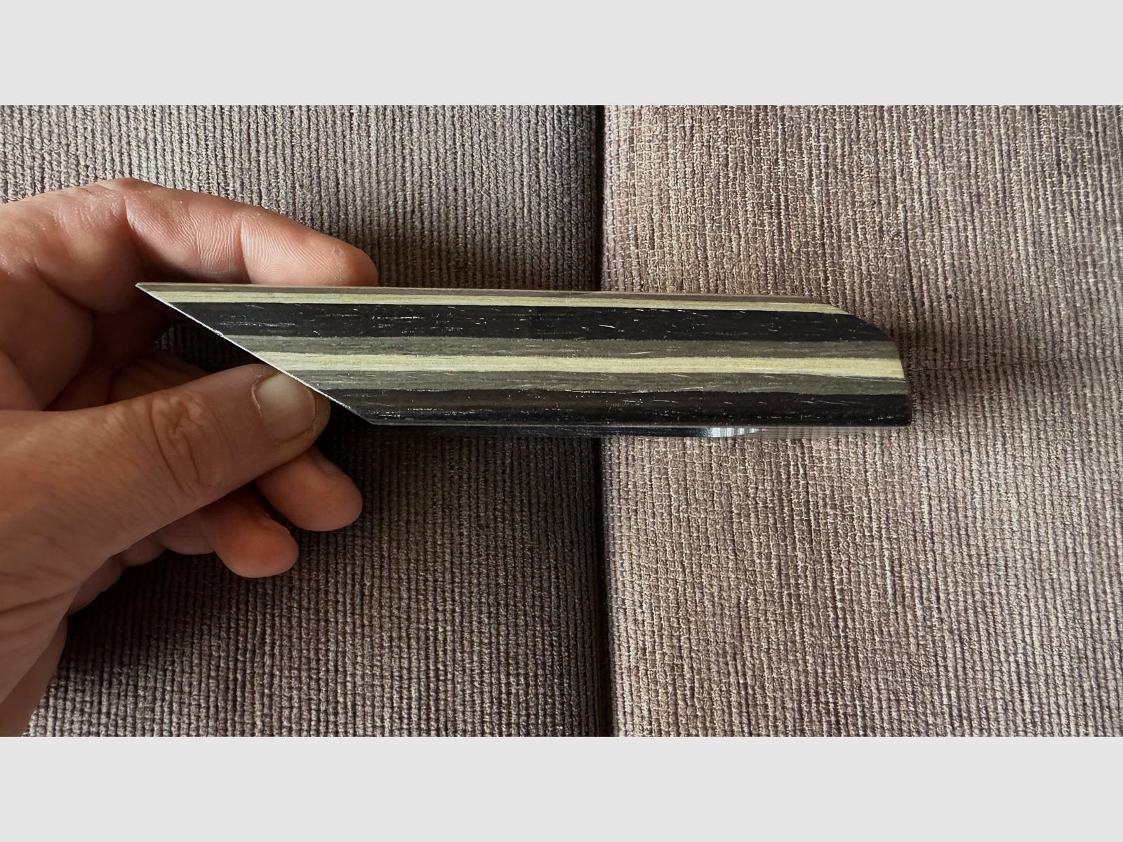 Feinwerkbau 700 cheek piece made of laminated wood.
