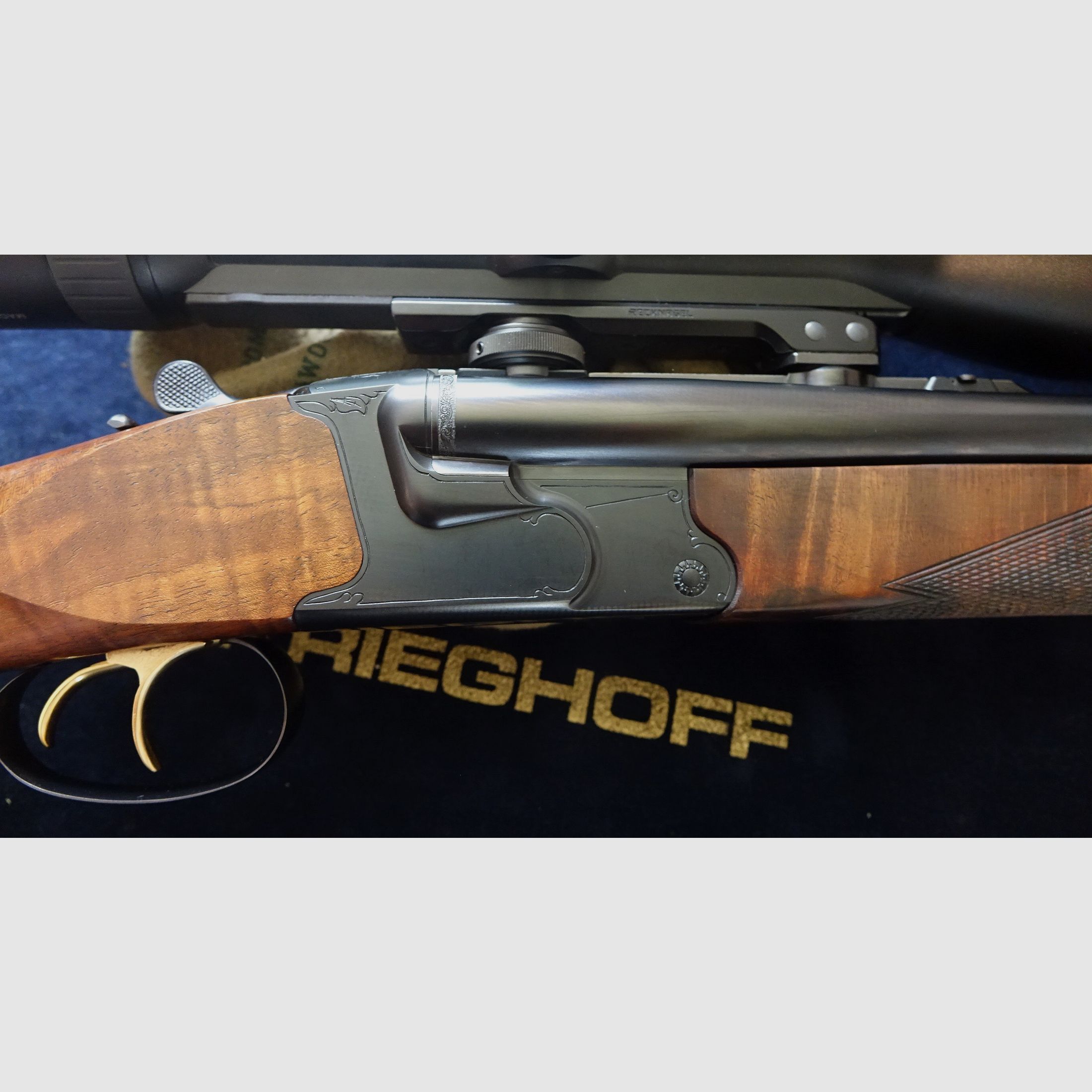 Krieghoff Optima TS Drilling in 8x57 IRS - 20/76 - detachable barrel .22 Hornet incl. second barrel set DBD 9.3x74R-20/76 incl. Swarovski Z6i 2.5-15x56