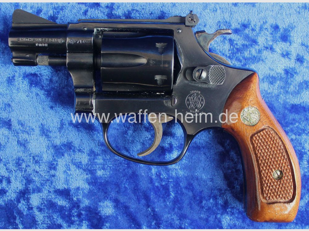 Smith & Wesson	 34 - 1 / 2"