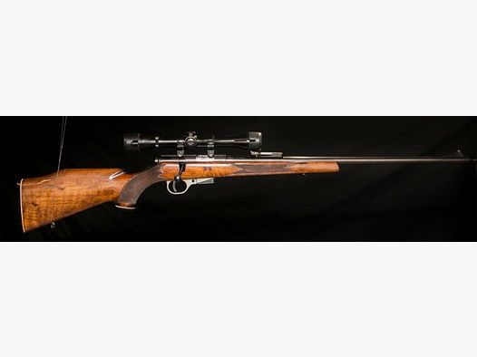 Closed season repeater rifle with scope small caliber