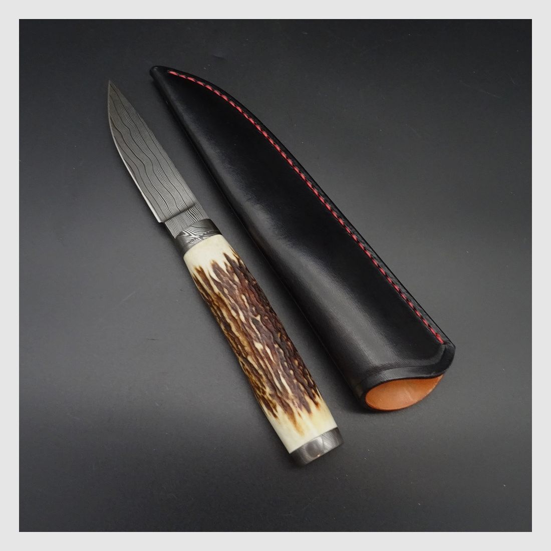 Preis inkl. 19% MwSt - Messer Schmidbauer Hunter Jagdmesser Damastklinge (9,4 cm), Sambar Hirsch