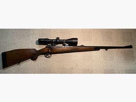 Repetierbüchse FN, Modell K98, Kaliber 7x64, dt. Stecher, mit Leuchtpunktabsehen 4C Meostar 3-12x56 R1r und hochwertiger EAW-Schwenkmontage