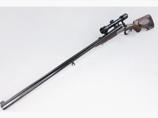 used Ferlacher cocking gun with mounted Hensoldt 4x32