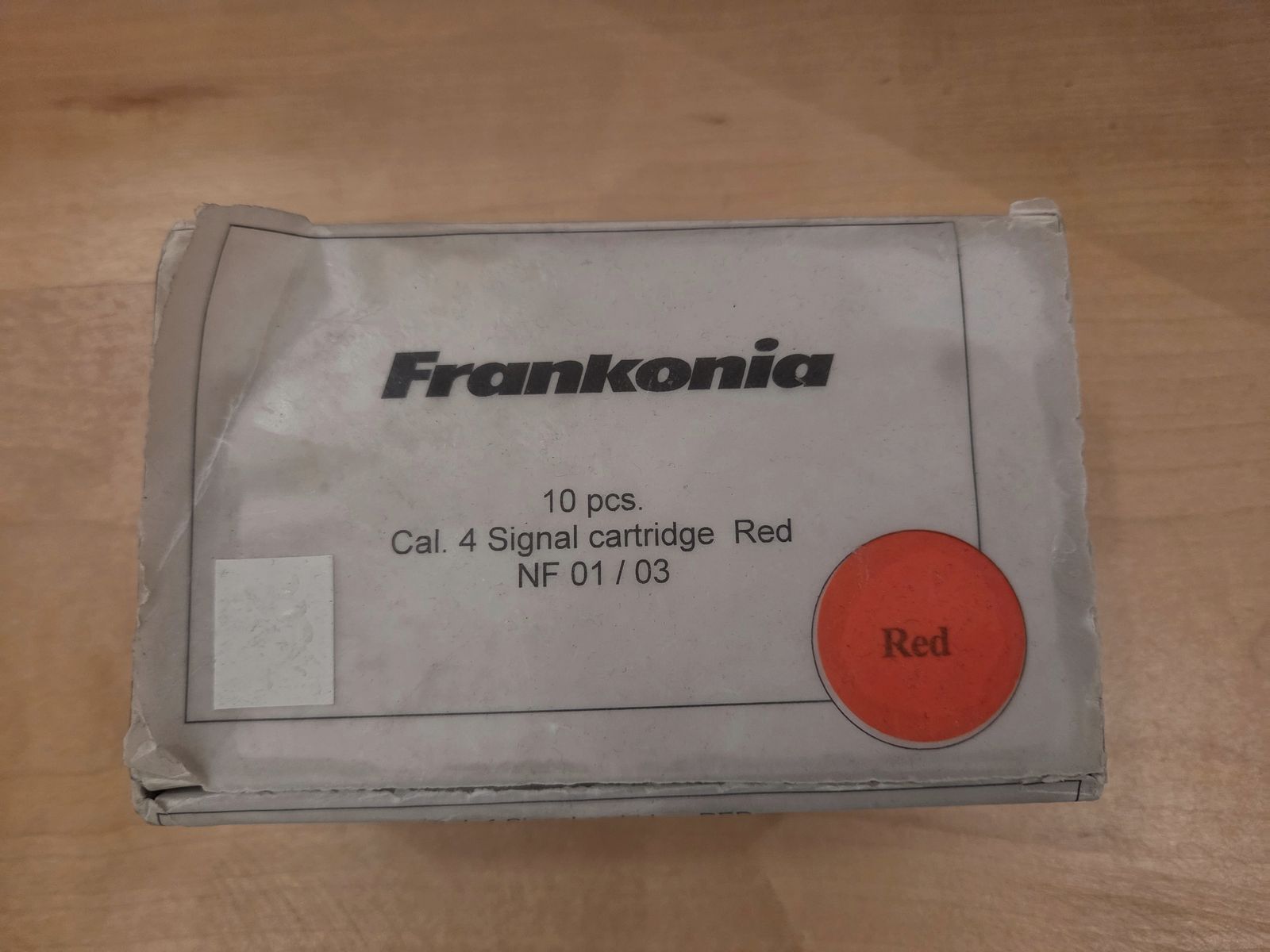 Flare gun with red signal ammunition