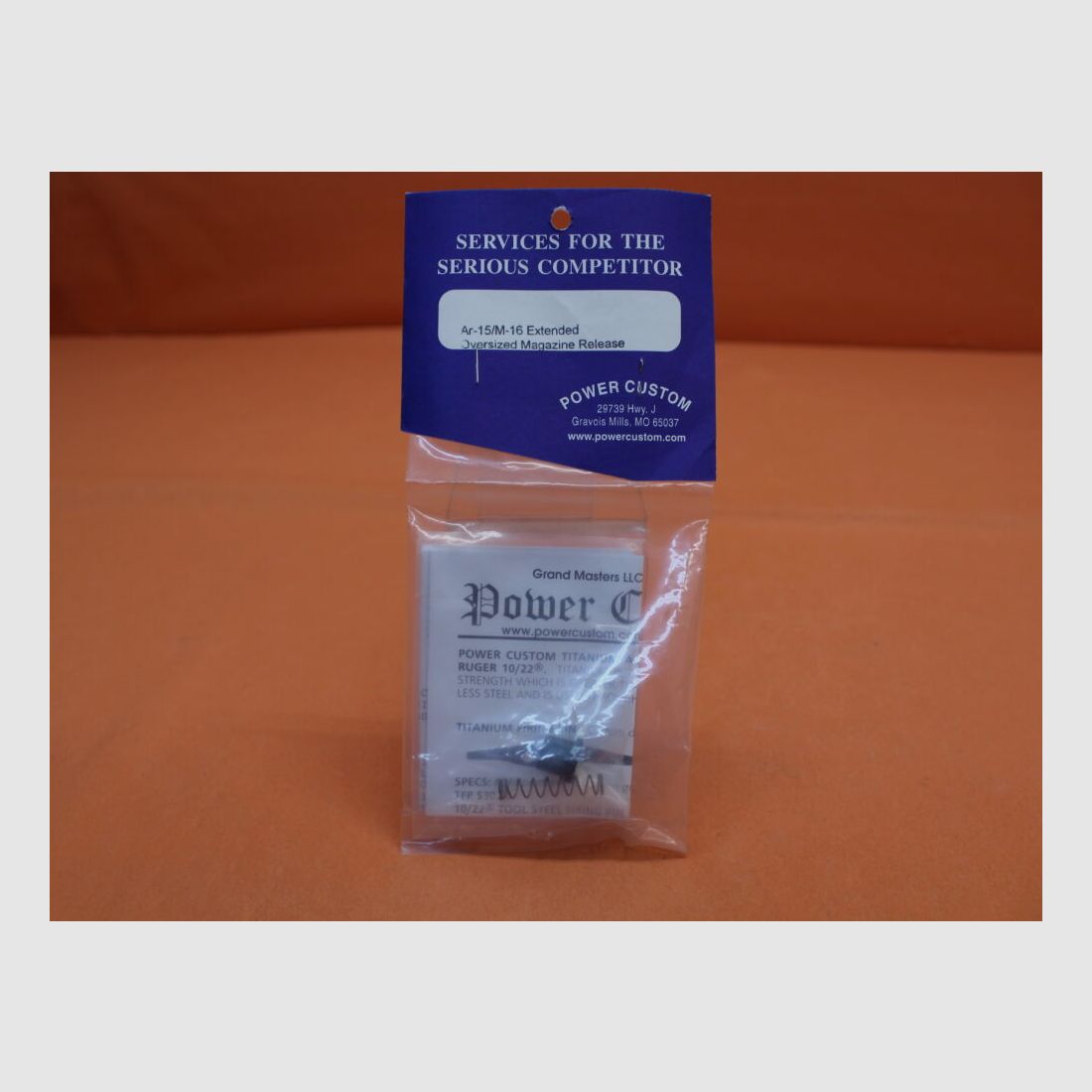 Power Custom AR-15: Oversized Magazine Release Button Power Custom Enlarged Magazine Holder.