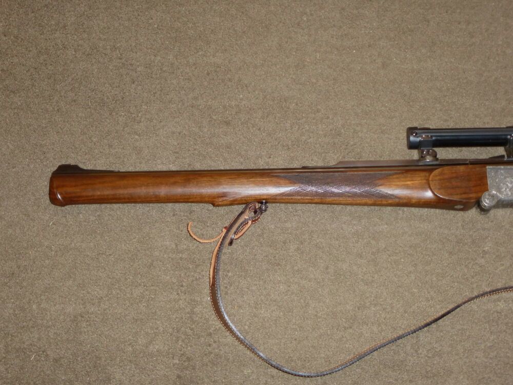 Otto Baier KS 88, zur izquierda, Cal. .416 Rigby, 6x70R