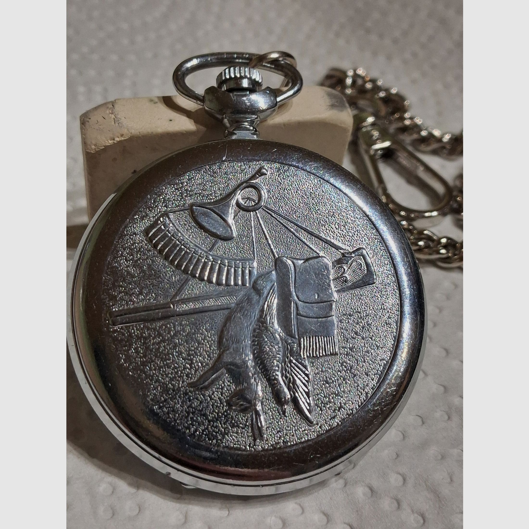 Zakhorloge met jachtthema