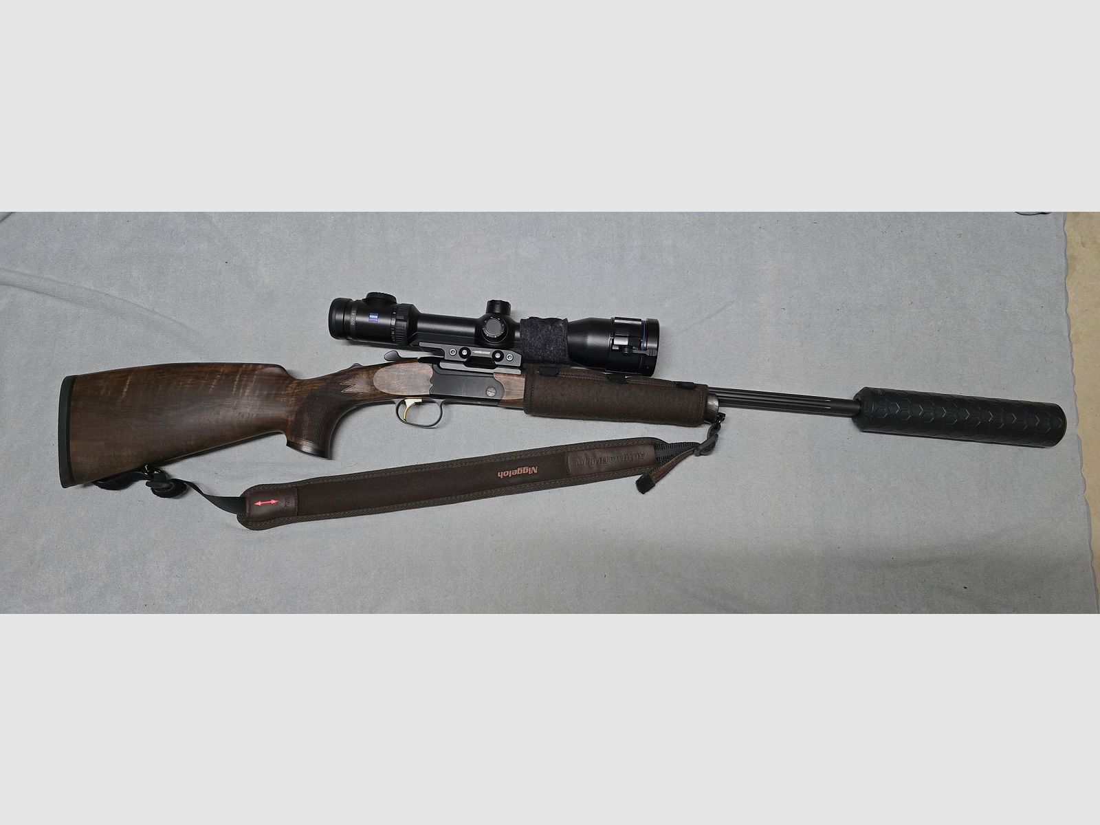 Merkel K5 Extrem with ZEISS V8 1.8-14x50 riflescope with rail and VANWARD Hunter PRO, overbarrel titanium suppressor for caliber .30
