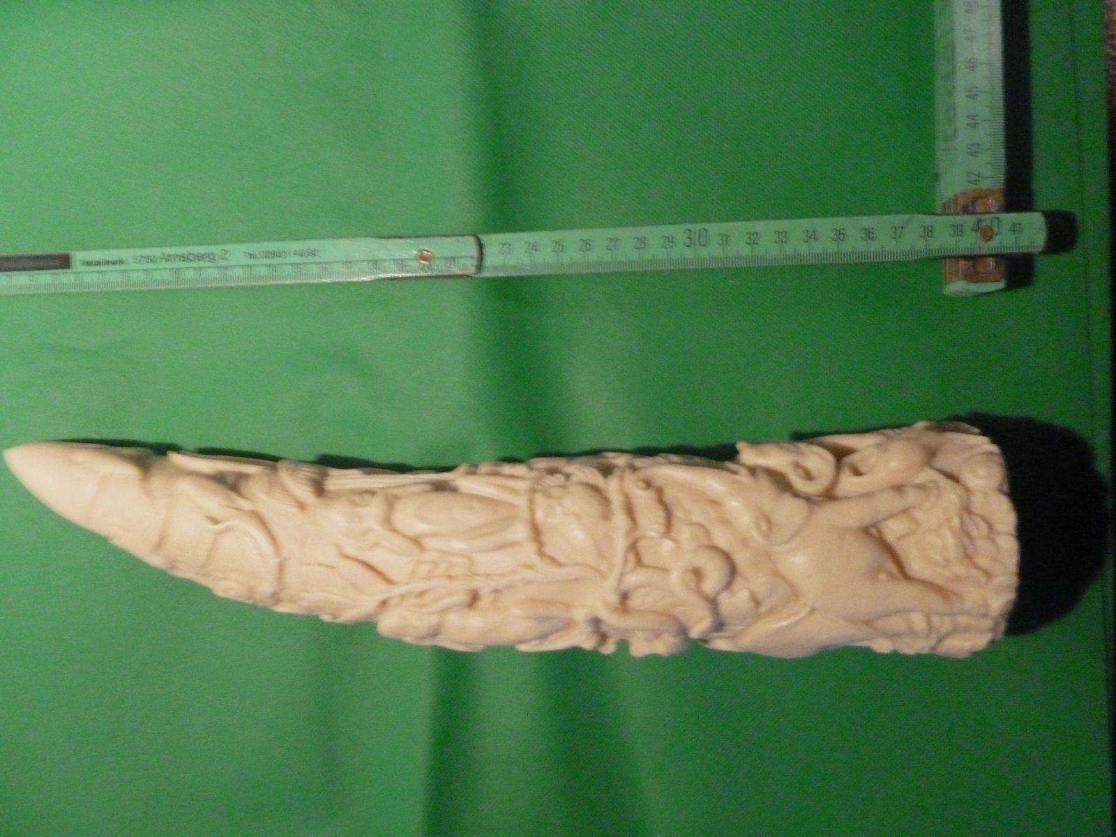 Carved elephant tusk made of resin