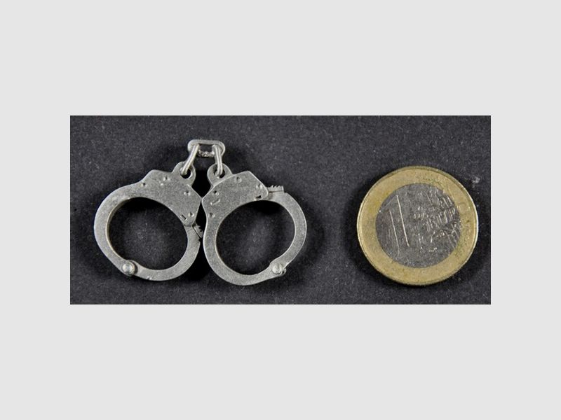 Handschellen als Metall-Anstecker