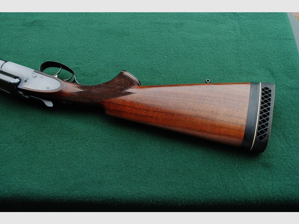 CAS escopeta de caza, auténticos cerrojos laterales, sin extractores, seguro manual.