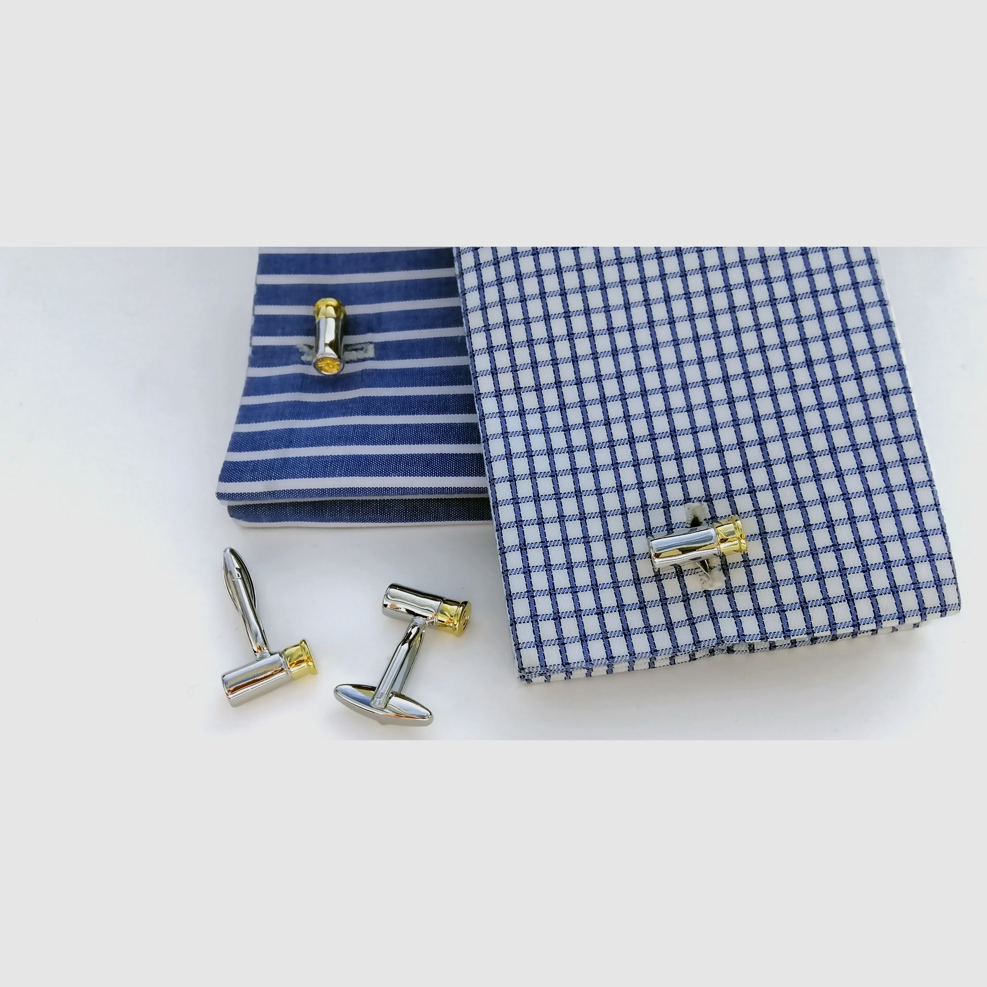 <Cufflinks in shotgun cartridge design>