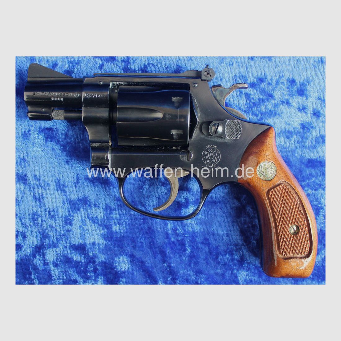 Smith & Wesson	 34 - 1 / 2"