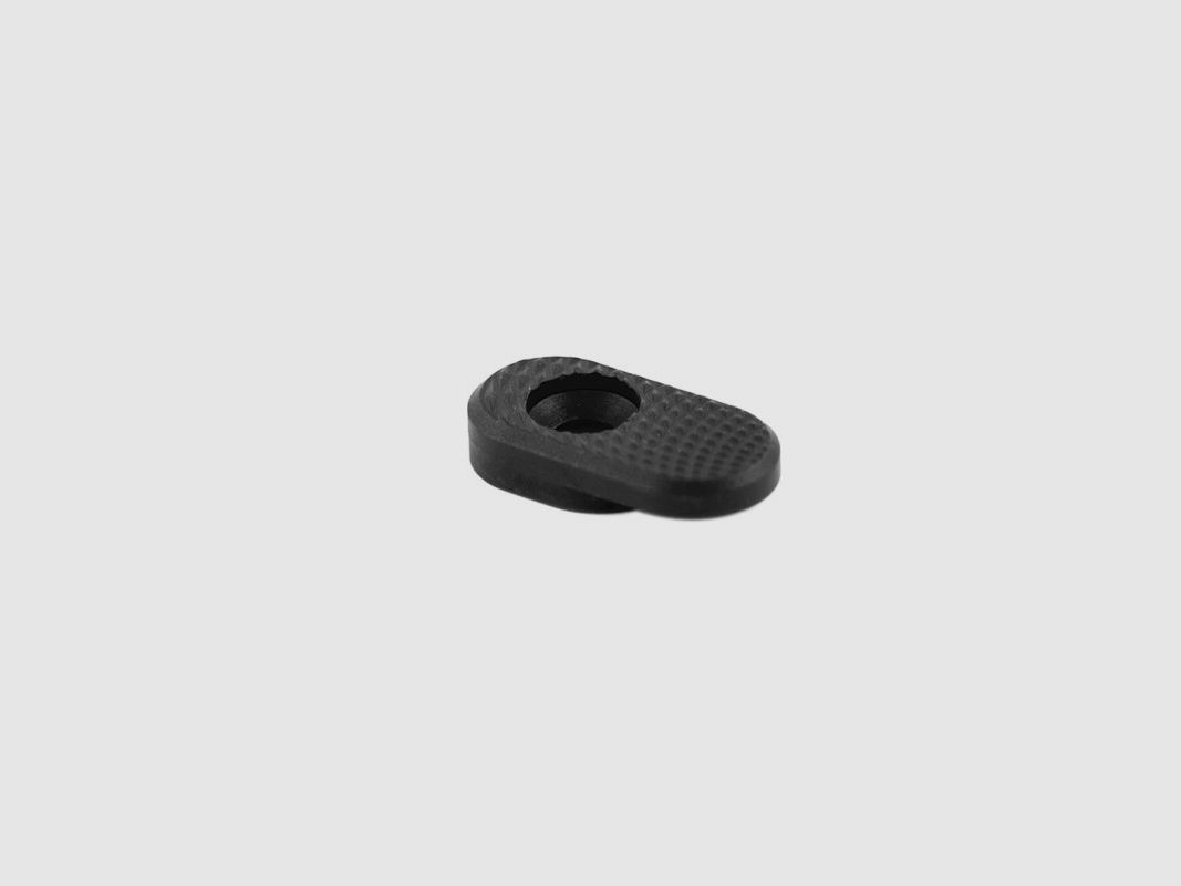 Oversized magazine release button for Tanfoglio