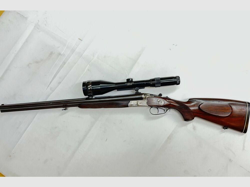 Sauer & Sohn Drilling Cal. 8x57 IRS, 16/70 canna intercambiabile .22 Hornet