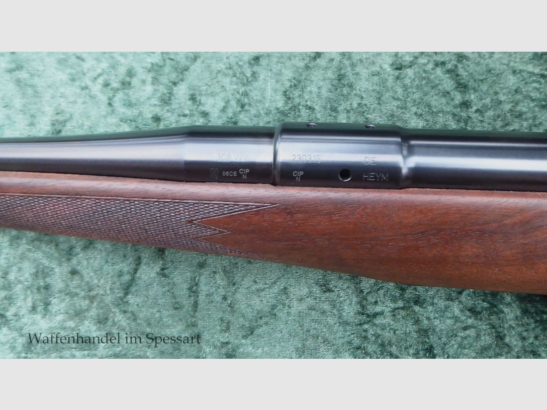 Repetitiegeweer Heym SR21, met klassieke kolf. Kal..308Win. Als nieuw.