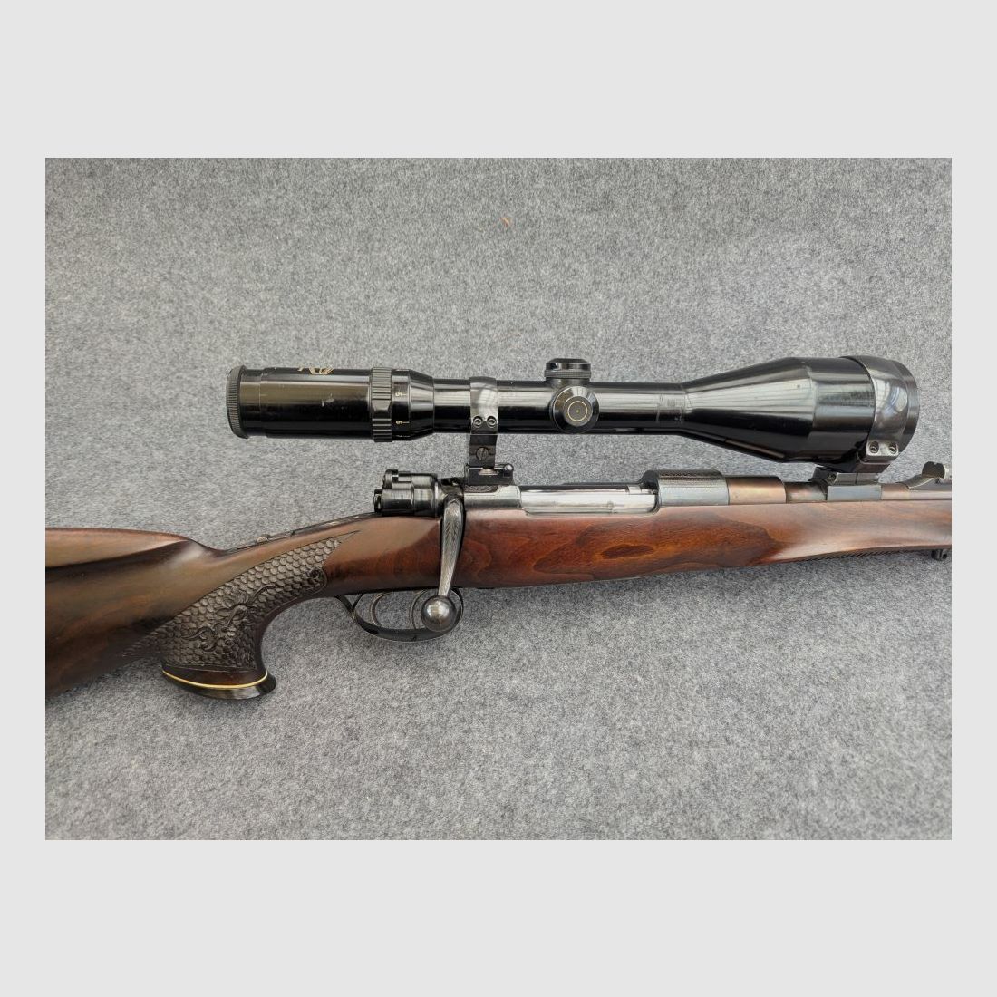 Mauser Mod 98 with animal engraving and stalking safety