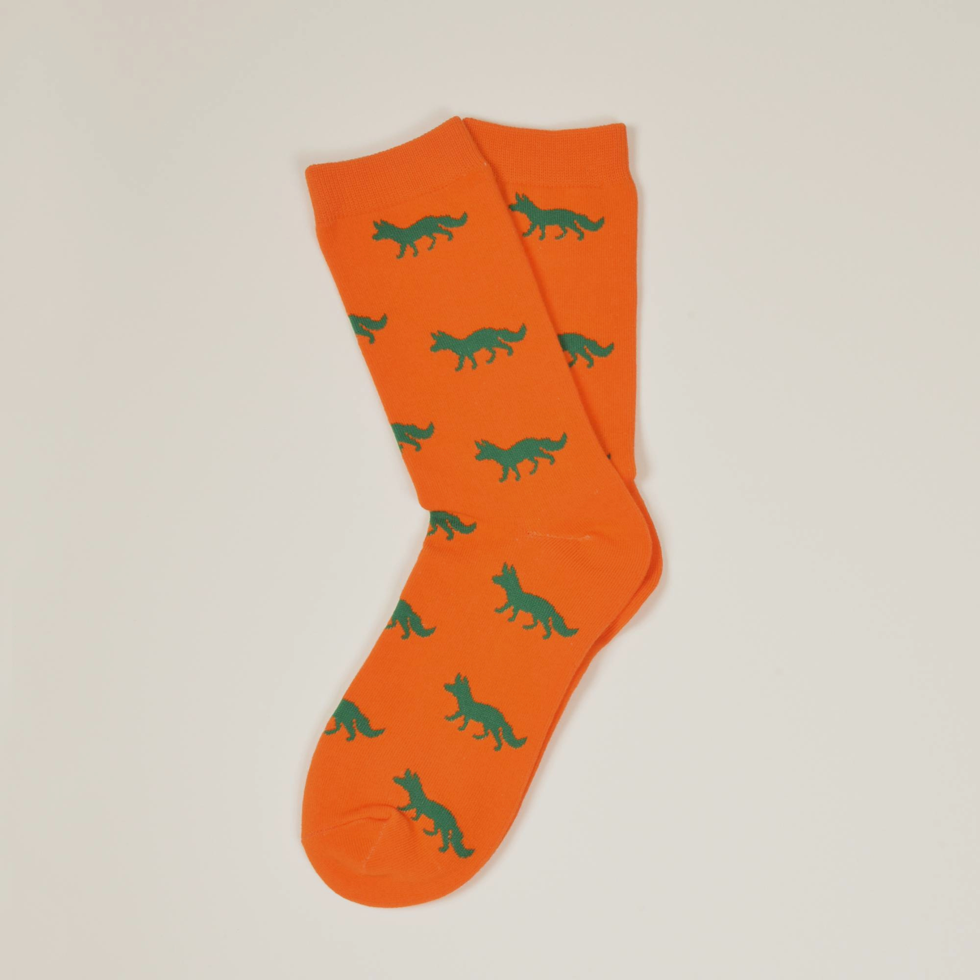 Orange Socken, Fuchs in Grün