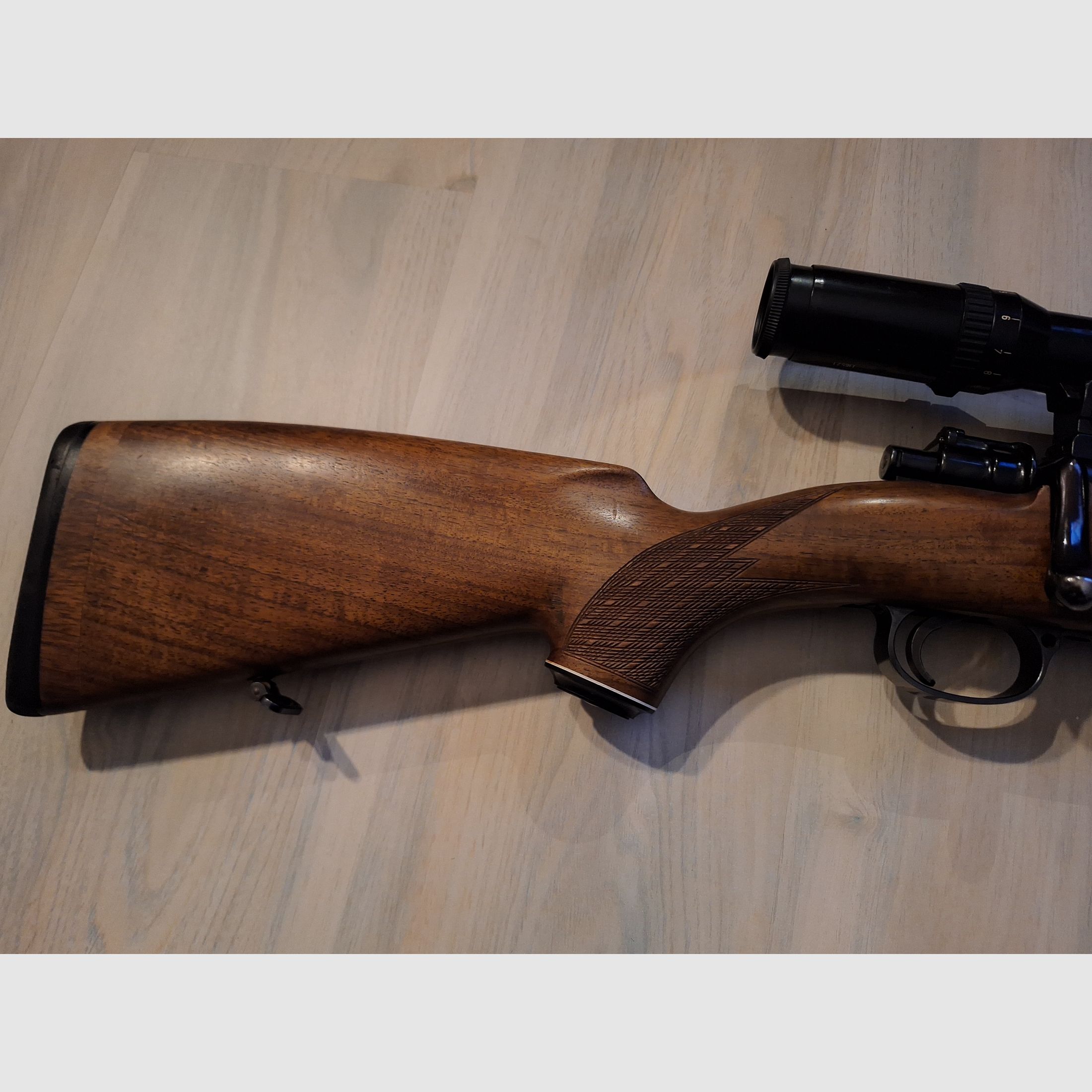 Repeater rifle based on Mauser 98 including scope 3-12x50