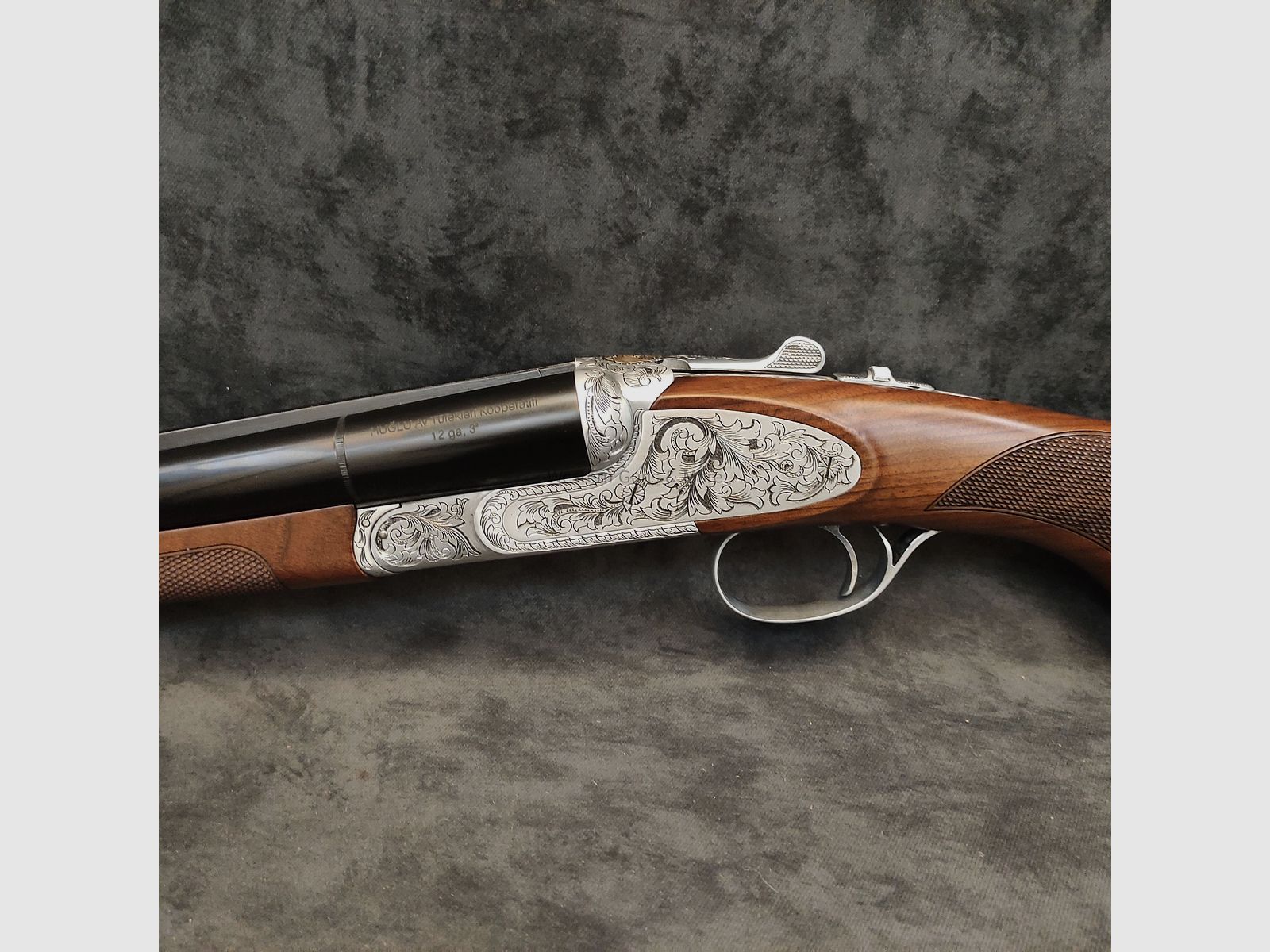 Huglu	 Huglu Kal.12/76  Mod.200AC Silber voll Graviert "Coachgun"