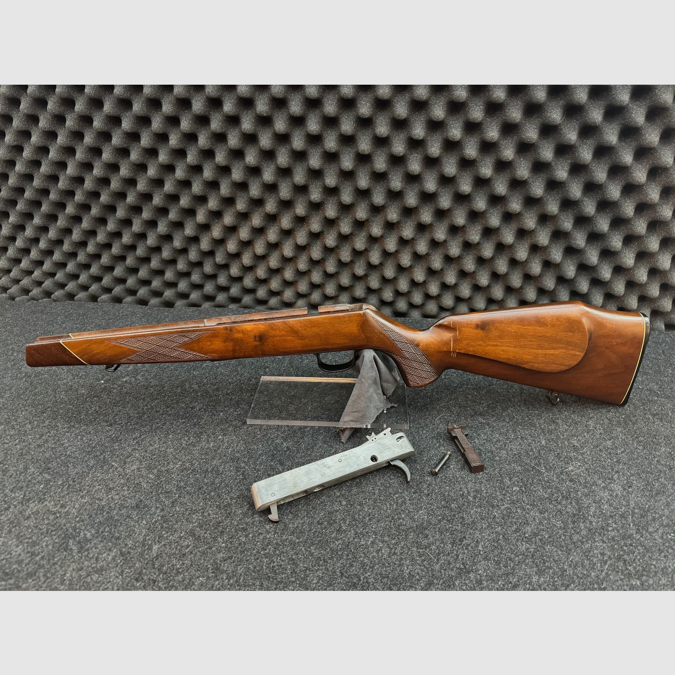 Stock and system bedding with removal and safety Voere 22lr repeating rifle