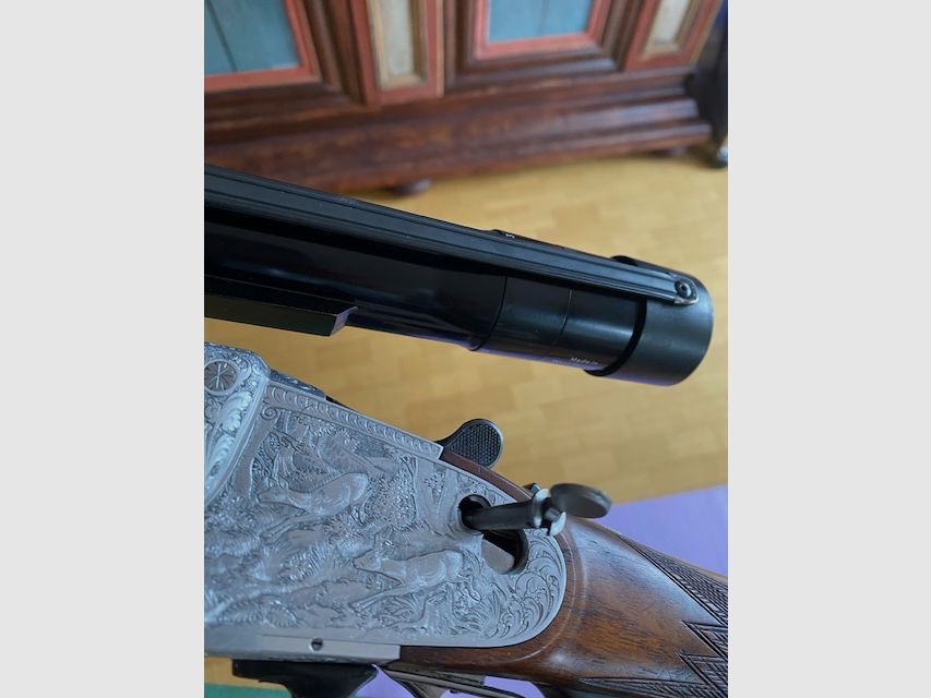 Krieghoff Ulm Modelo Ulm Cerrojo lateral Holland & Holland escopeta de doble cañón con cañón intercambiable 6,5x57R 20/76 Magnum 16/70 16/70 en maletín en excelente estado BBF BDF