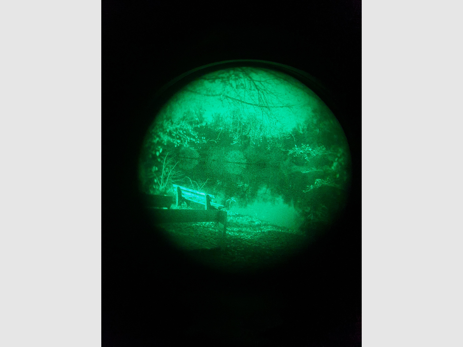 Night vision device residual light amplifier with helmet mount and carrying cap, so for wearing without a helmet