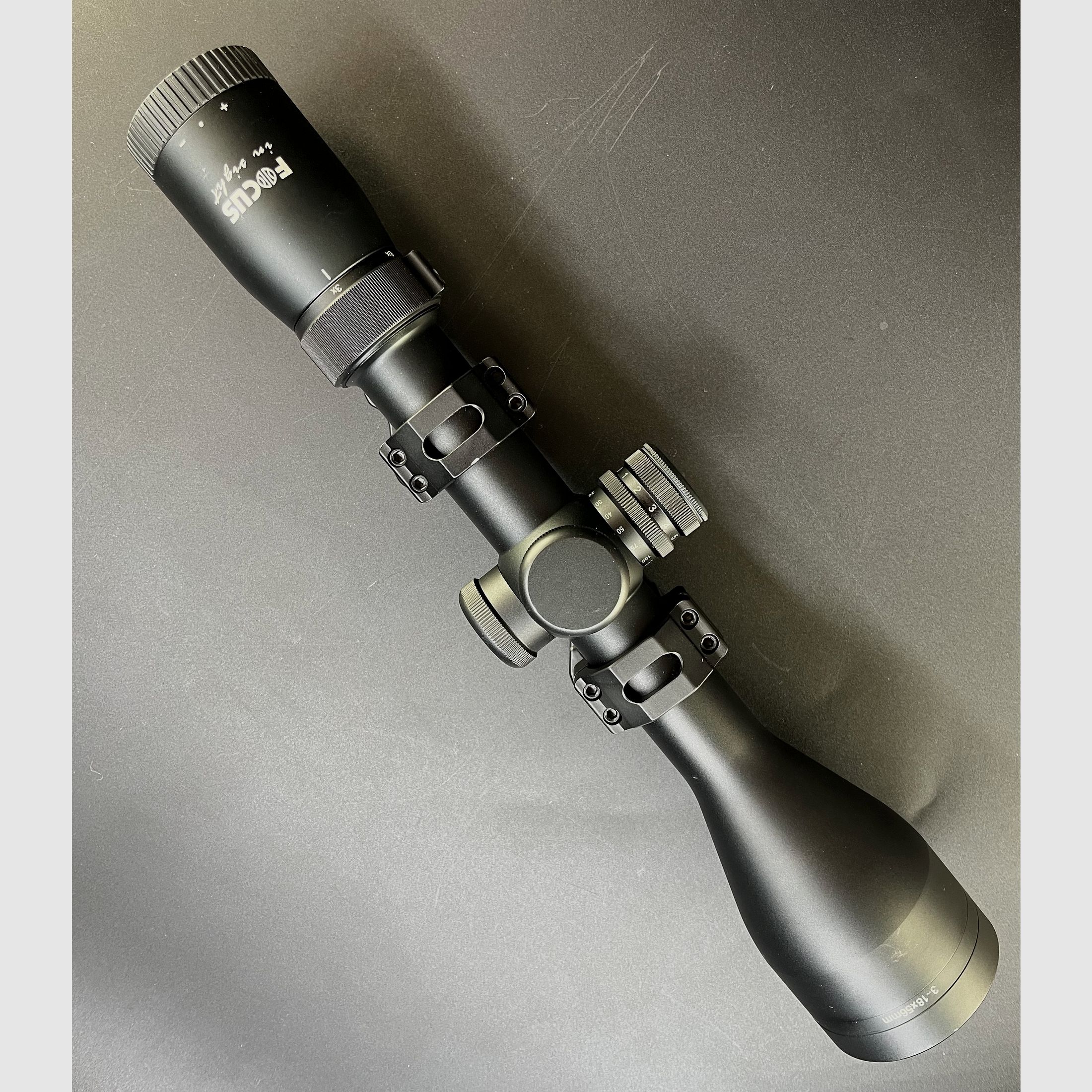 Exhibitor FOCUS In Sight 3-18x56 #4 30mm Parallax with ring mount