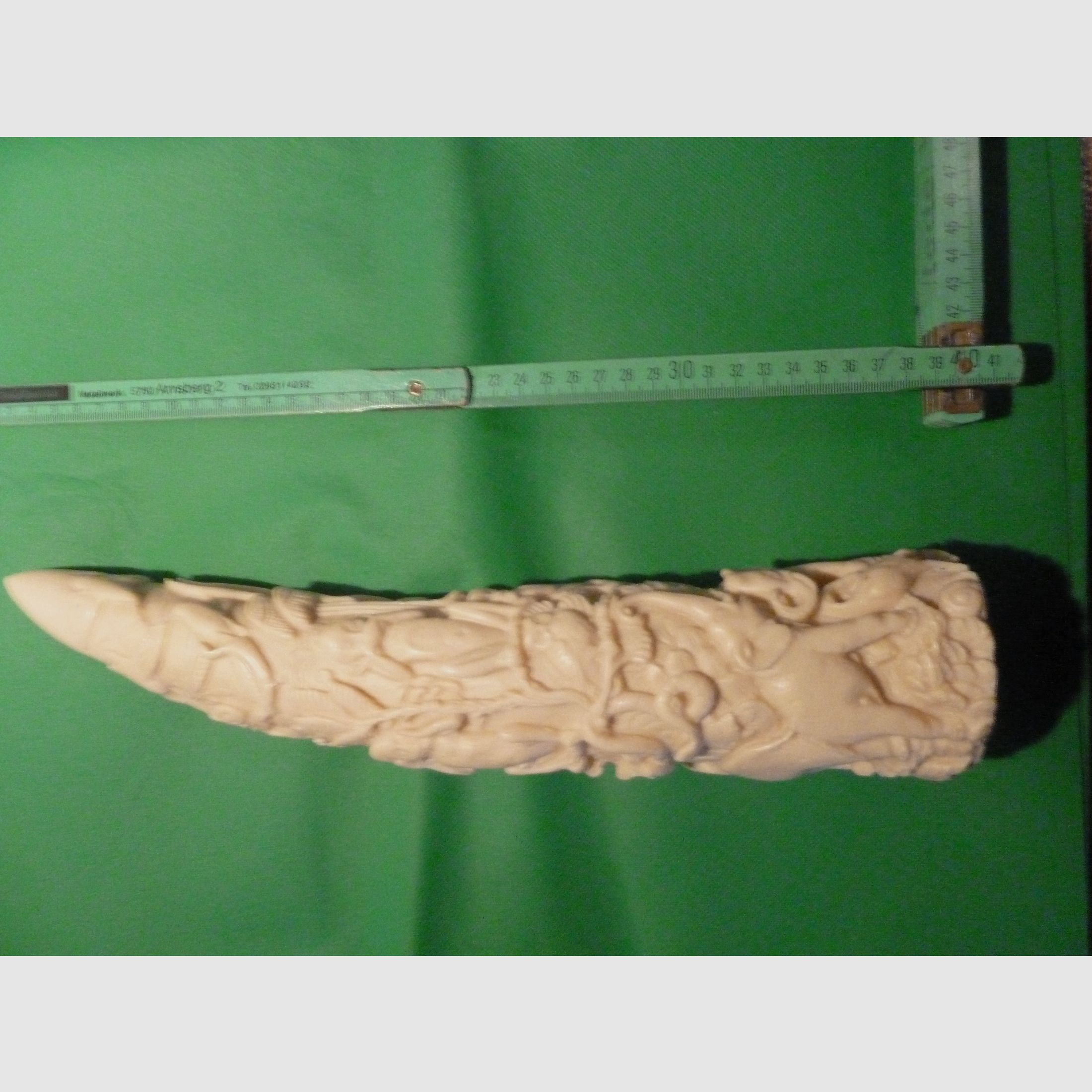 Carved elephant tusk made of resin