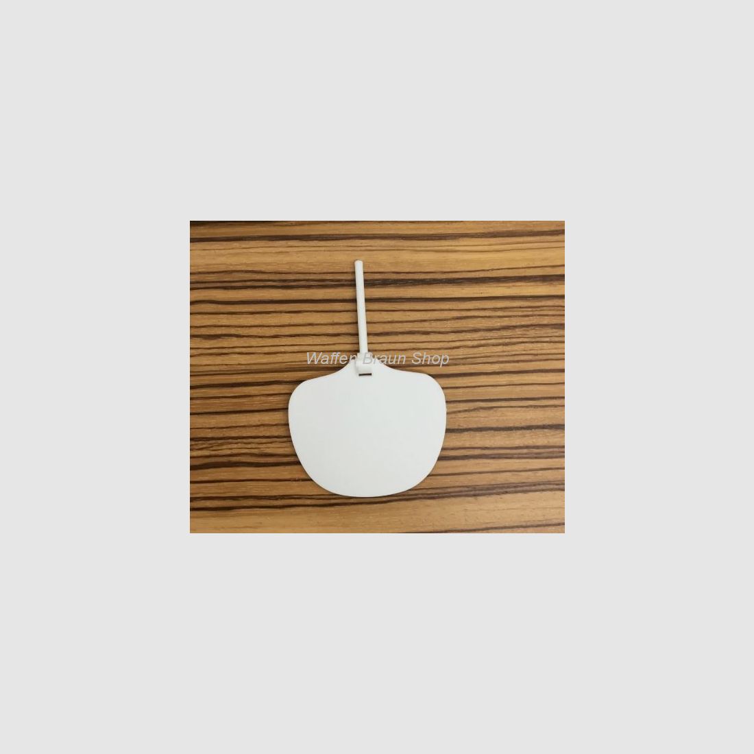 Écran de protection pour lunettes de tir ou bandeau. Blanc, plastique.