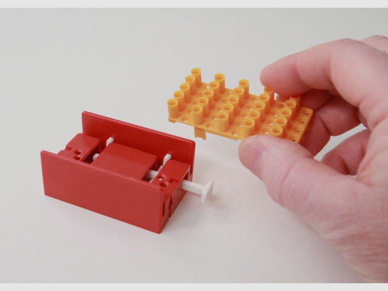 Aide à l'extraction de cartouches