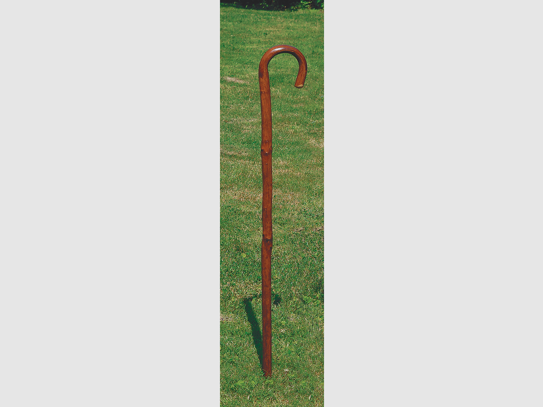 Walking stick made of flamed solid wood