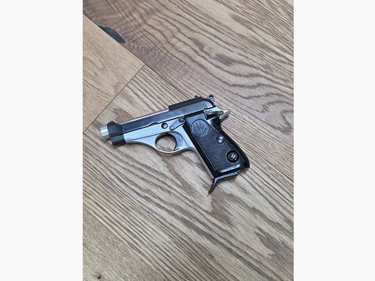 Pistola Beretta Mod. 70 7.65 mm Browning usada, bicolor