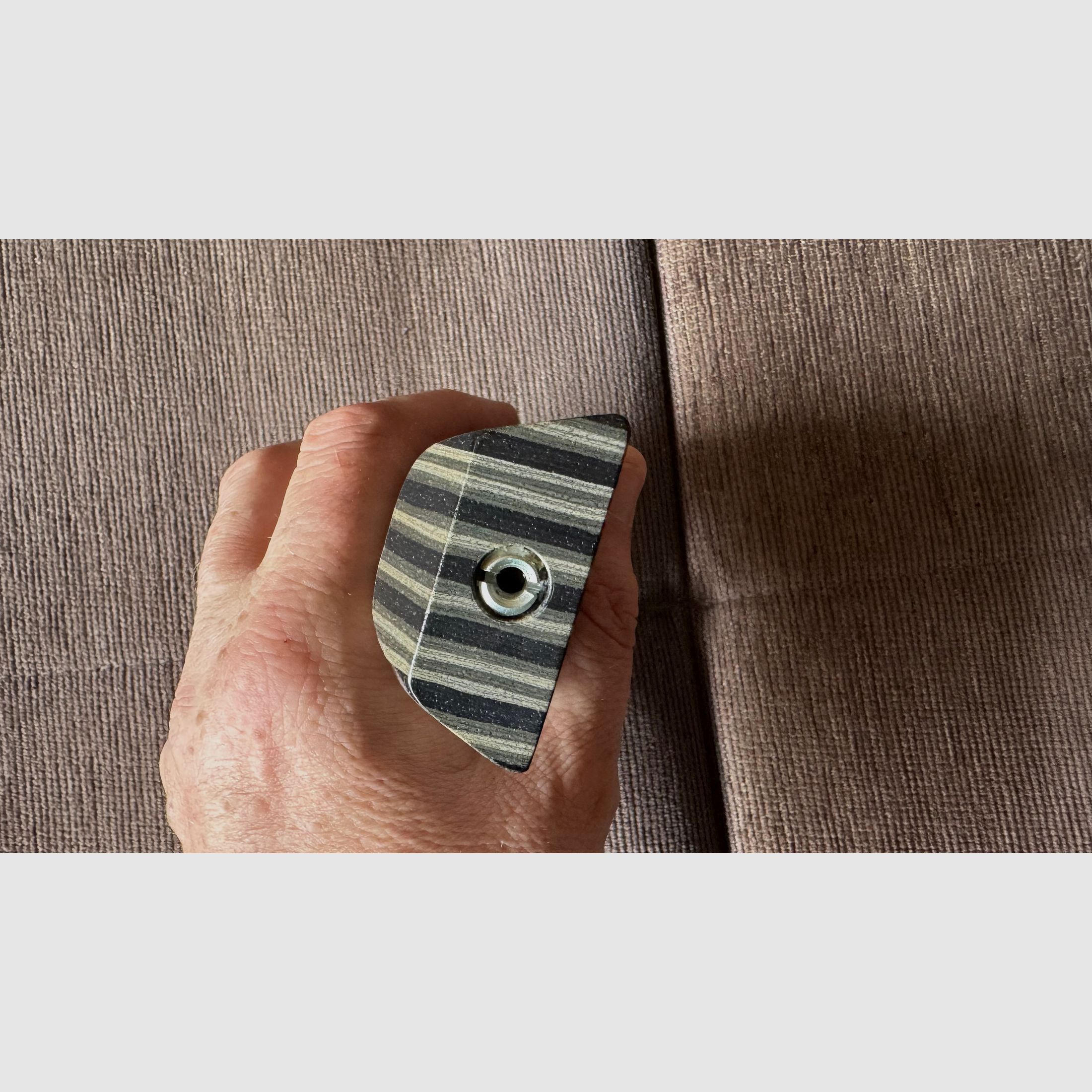 Feinwerkbau 700 cheek piece made of laminated wood.
