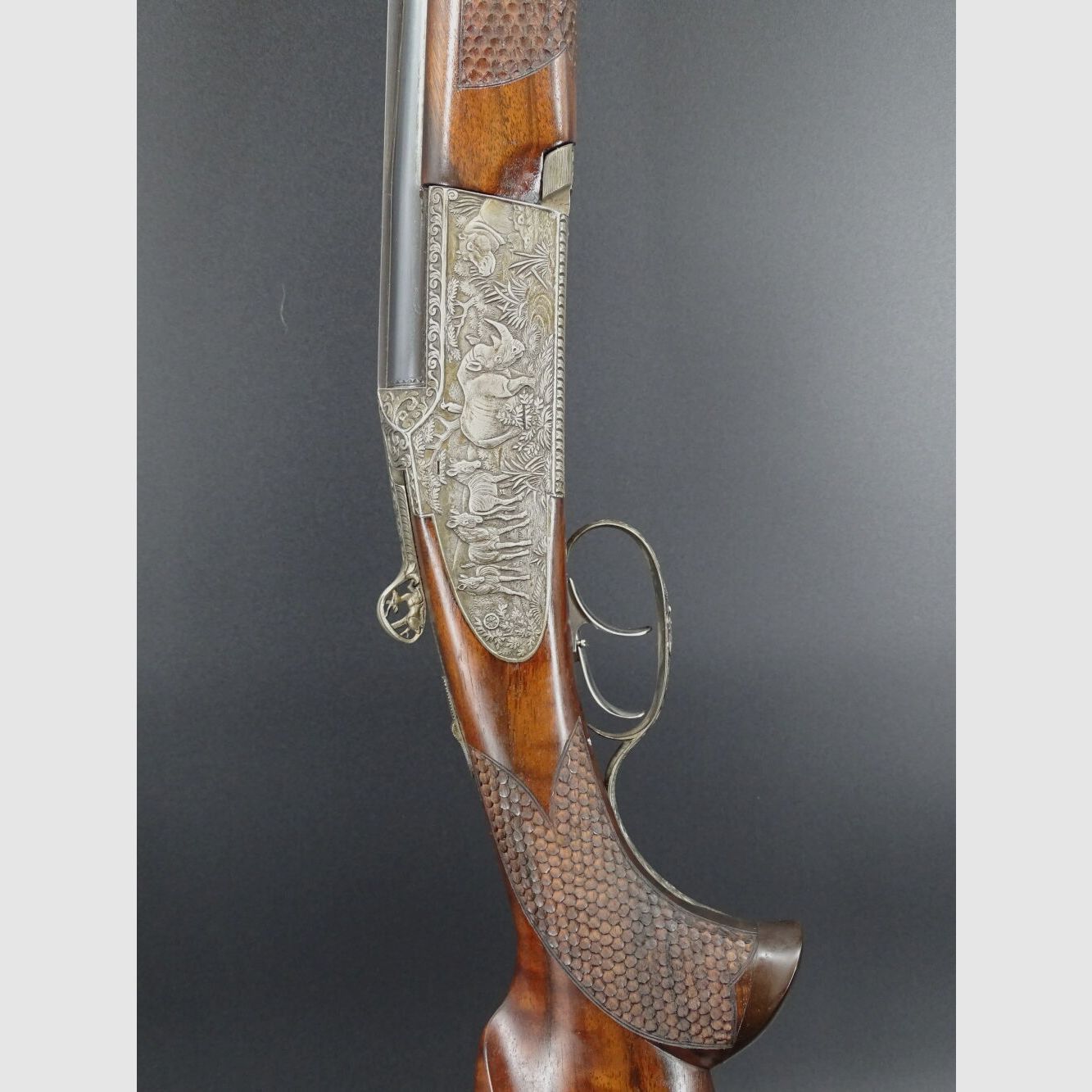 Rifle doble Mischitz grabado rinoceronte bisonte guepardo calibre 9,3x74R liquidación de colección
