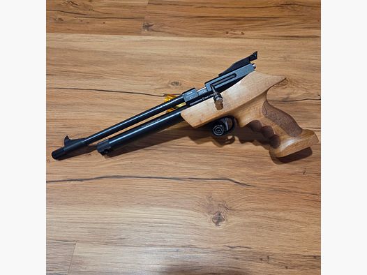 Diana Chaser with wooden handle and a pack of diabolos