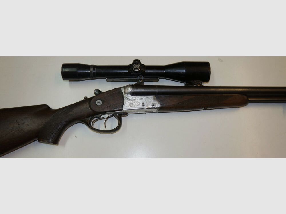 Krieghoff Drilling, Krieghoff, Kal.7x57R / Kal.16/70, mit GECO Zielfernrohr und schönen Gravuren