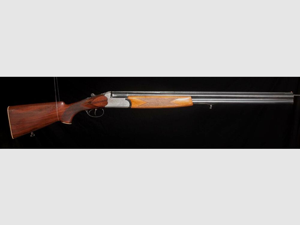 Double-barreled shotgun with ejector